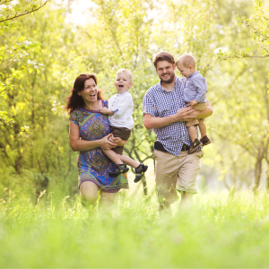 Family of four enjoying an fun day outdoors